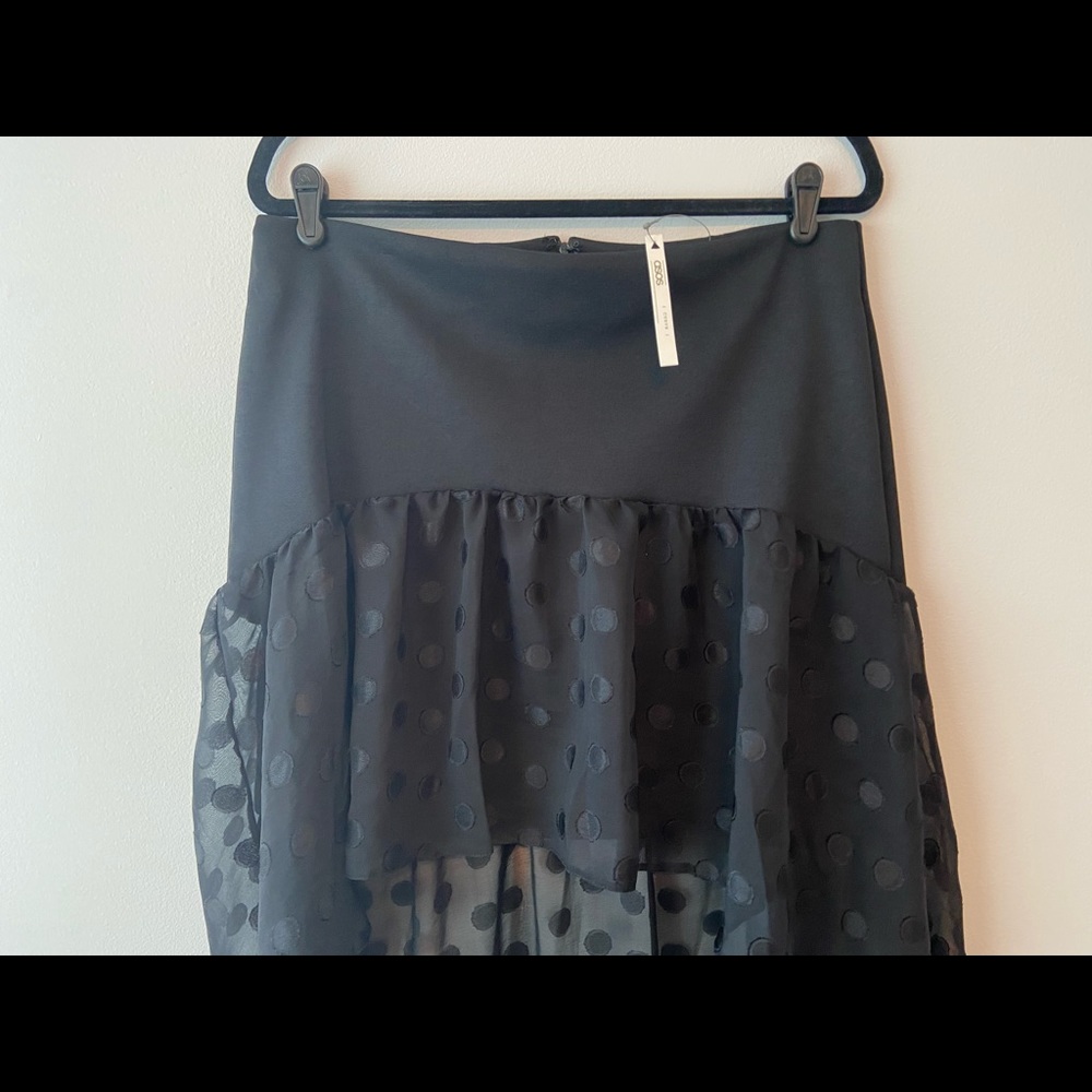 Fun and flirty hi-low polka dot skirt